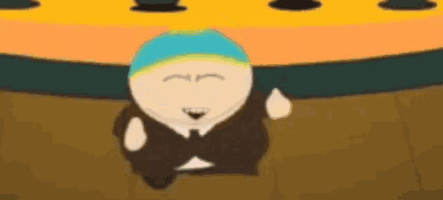 a cartoon character in a suit and tie is standing in front of a table .