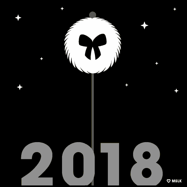 a black background with yellow numbers 2018 and a white ball with a bow on it