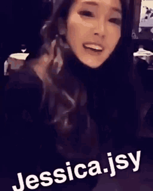 a close up of a woman 's face with the words jessica.jsy written on the bottom .