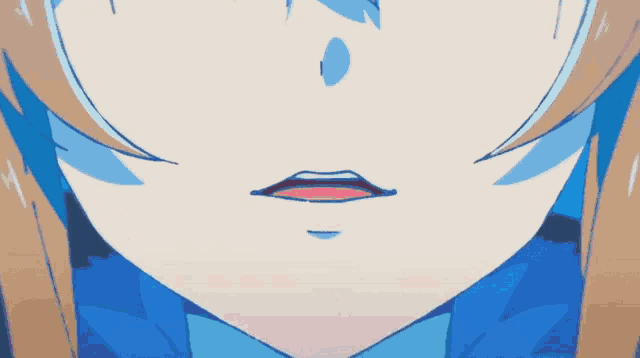 a close up of a girl 's face with blue eyes