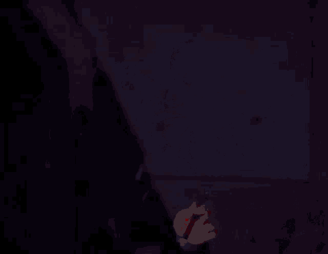 a blurry picture of a man with the word uhhh on the bottom right