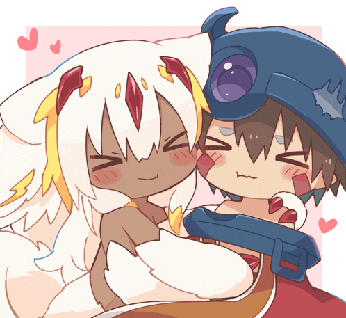a boy and a girl are hugging each other and the girl is wearing a blue hat