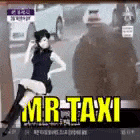 a picture of a woman sitting on a pole with the words mr taxi written on it .