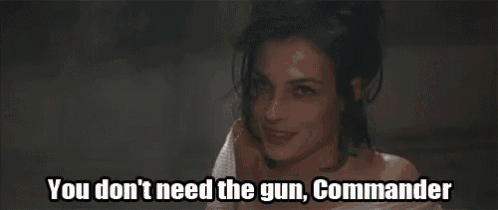 a woman is smiling and saying you don 't need the gun commander .