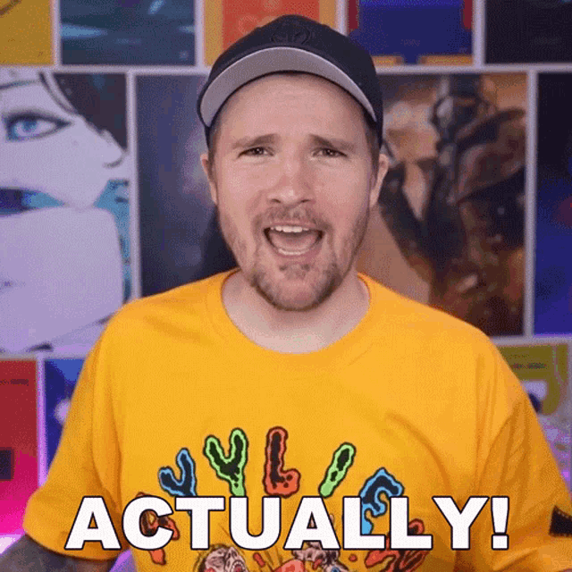 a man wearing a yellow shirt that says " actually "