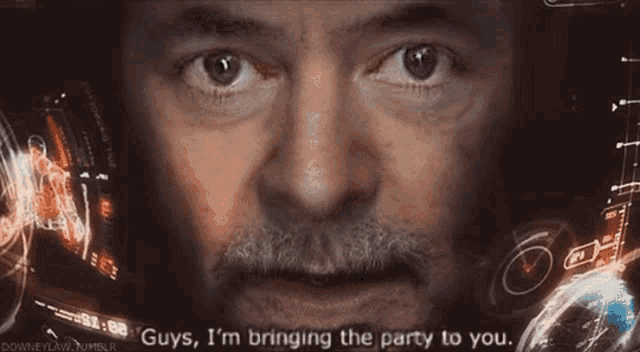 a close up of a man 's face with the words guys i 'm bringing the party to you on the bottom