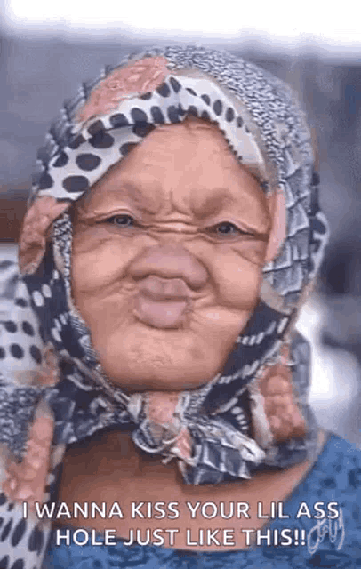 a woman wearing a scarf on her head is making a funny face .