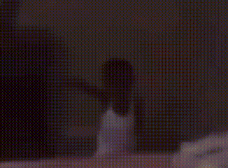a close up of a person 's face with a blurred background