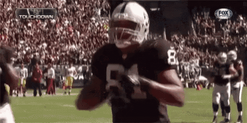 a football player with the number 51 on his jersey is running on the field