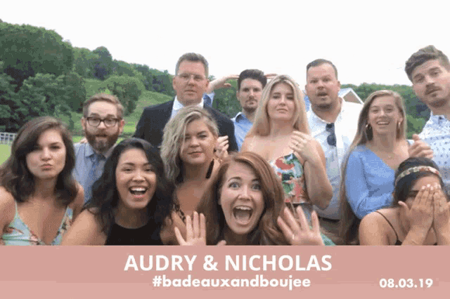 a group of people posing for a photo with the words audry & nicholas #badeauxandboujee