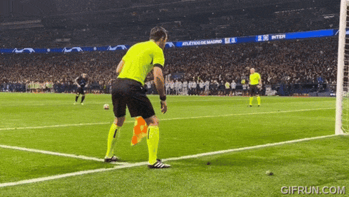 a soccer game is being played in a stadium with a scoreboard that says inter