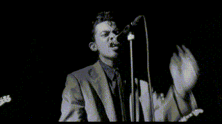 a black and white photo of a band with the word ali in white letters