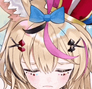 a close up of a anime girl with a blue bow on her head and playing cards on her face .