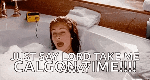 a woman is laying in a bathtub with the words just say lord take me calgowaytime