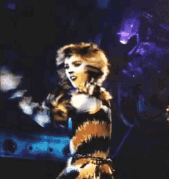 a painting of a woman in a cat costume on a stage