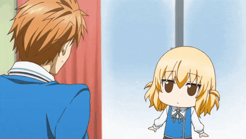 a boy and a girl are standing next to each other in a room