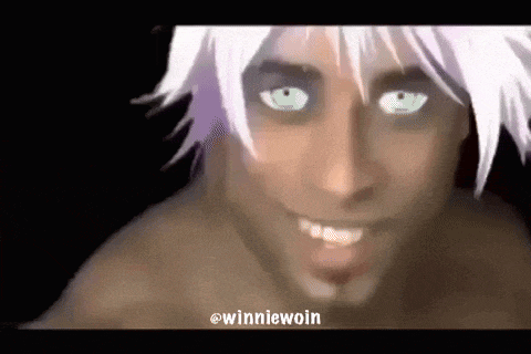 a close up of a person 's face with a wig on and green eyes .