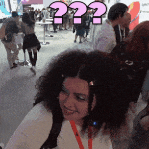 a woman with curly hair has a question mark on her head