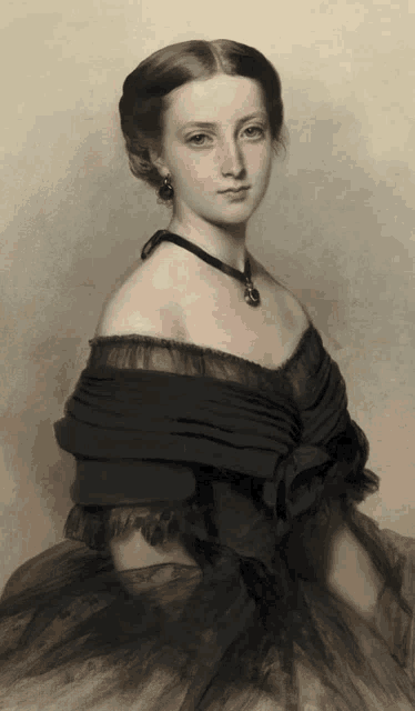 a woman wearing a black dress and a necklace