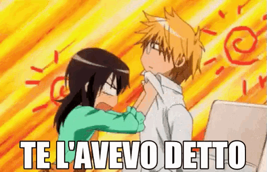 a man and a woman are standing next to each other and the words te l' avevo detto are written on the bottom