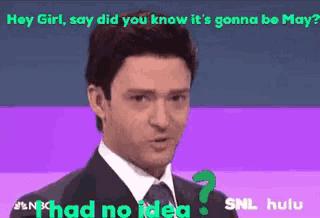 a man in a suit and tie is asking a question