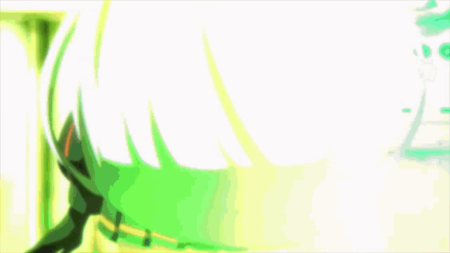 a close up of a person 's head with green hair