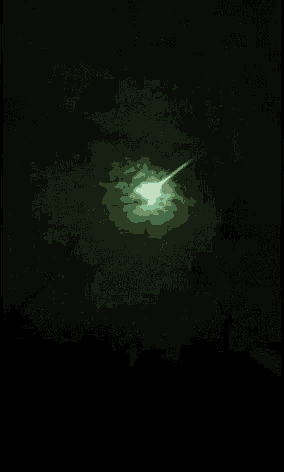 a full moon shines through the clouds in a dark night sky