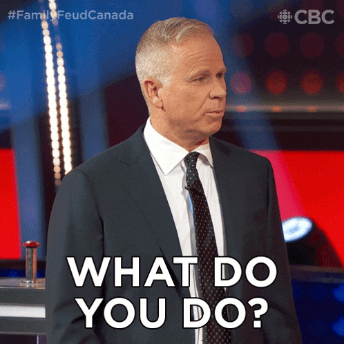 a man in a suit and tie asks what do you do