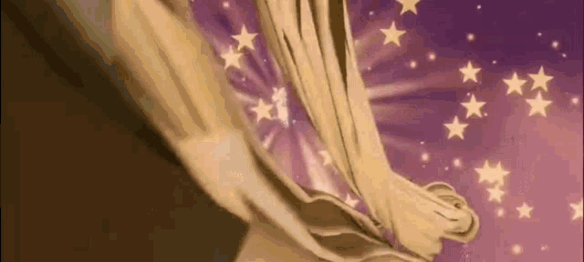 a woman is standing in front of a purple curtain with stars falling from it .
