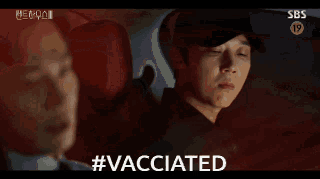 the word vaccinated that is on a red surface