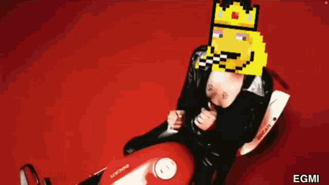 a woman on a ducati motorcycle with a pixelated face on her head
