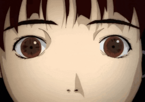 a close up of a person 's eyes with a clock on them