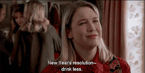 a woman in a red shirt is saying `` new year 's resolution - drink less . ''