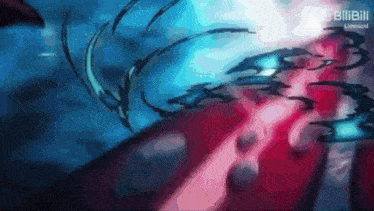 a blue and red background with a blurred image of a person 's face