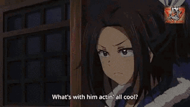 a girl in a ponytail is standing in front of a window and talking to a man .