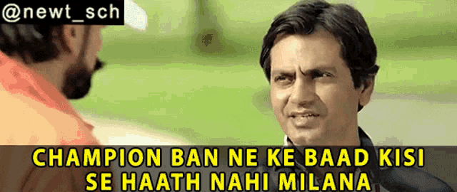a man talking to another man with a caption that says champion ban ne ke baad kisi se haath nahi milana