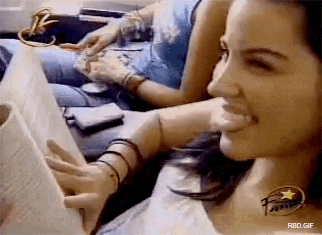 Maite Perroni Reading GIF - Maite Perroni Reading Tongue Out GIFs