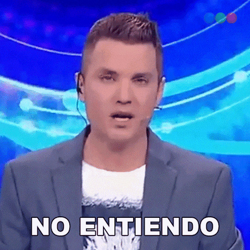 a man in a suit and ear buds says " no entiendo "