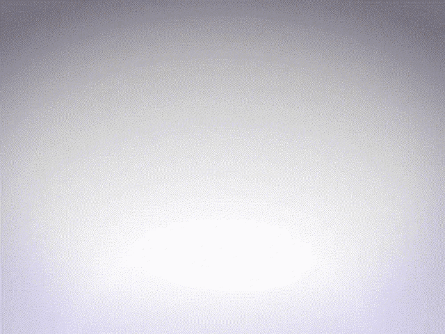 a white background with a gray border and a gray object in the corner