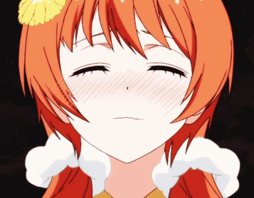 a girl with orange hair and a yellow flower on her head