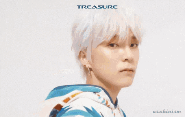 a young man with white hair is on a poster for treasure