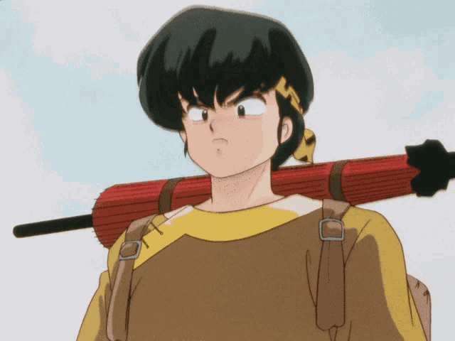 a boy with a backpack and an umbrella on his shoulder