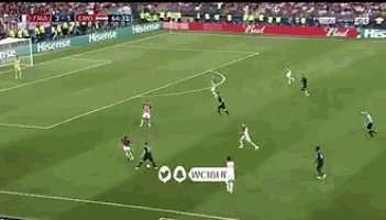 a soccer game is being played on a field with ads for hisense and bud on the sidelines