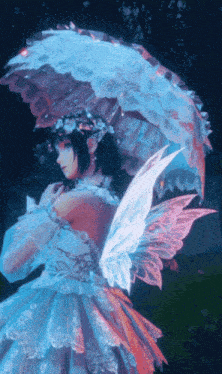 a fairy in a white dress with wings holding an umbrella