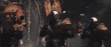 a group of soldiers are holding guns and one of them has the letter c on his helmet