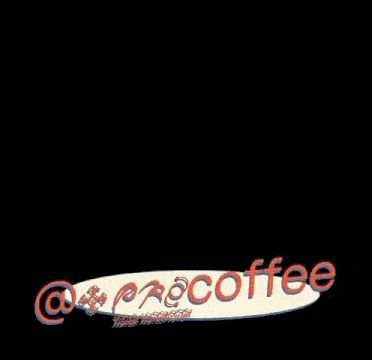 a white car is driving down a street next to a sign that says coffee