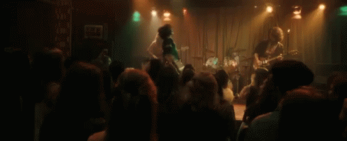 Put Your Hands Up Stage Performer GIF - Put Your Hands Up Stage Performer Playing Guitar GIFs