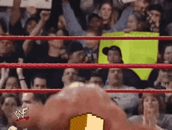a pixelated image of a wrestler in a wrestling ring with a w logo on his chest