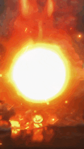 a large explosion with a white circle in the middle of it