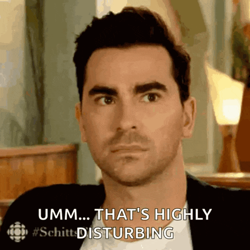 a man with a beard is making a funny face and saying umm that 's highly disturbing .